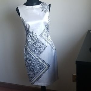 Cache white dress with a design on the front